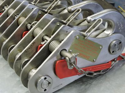 Palfinger Marine Safety AS Model LHR9 M2, variants 1 through 6, on-load/off-load release mechanism, for use with single or double-point suspension lifeboats and rescue boats; maximum approved working load is 9,000 kg (88.29 kN) per hook.